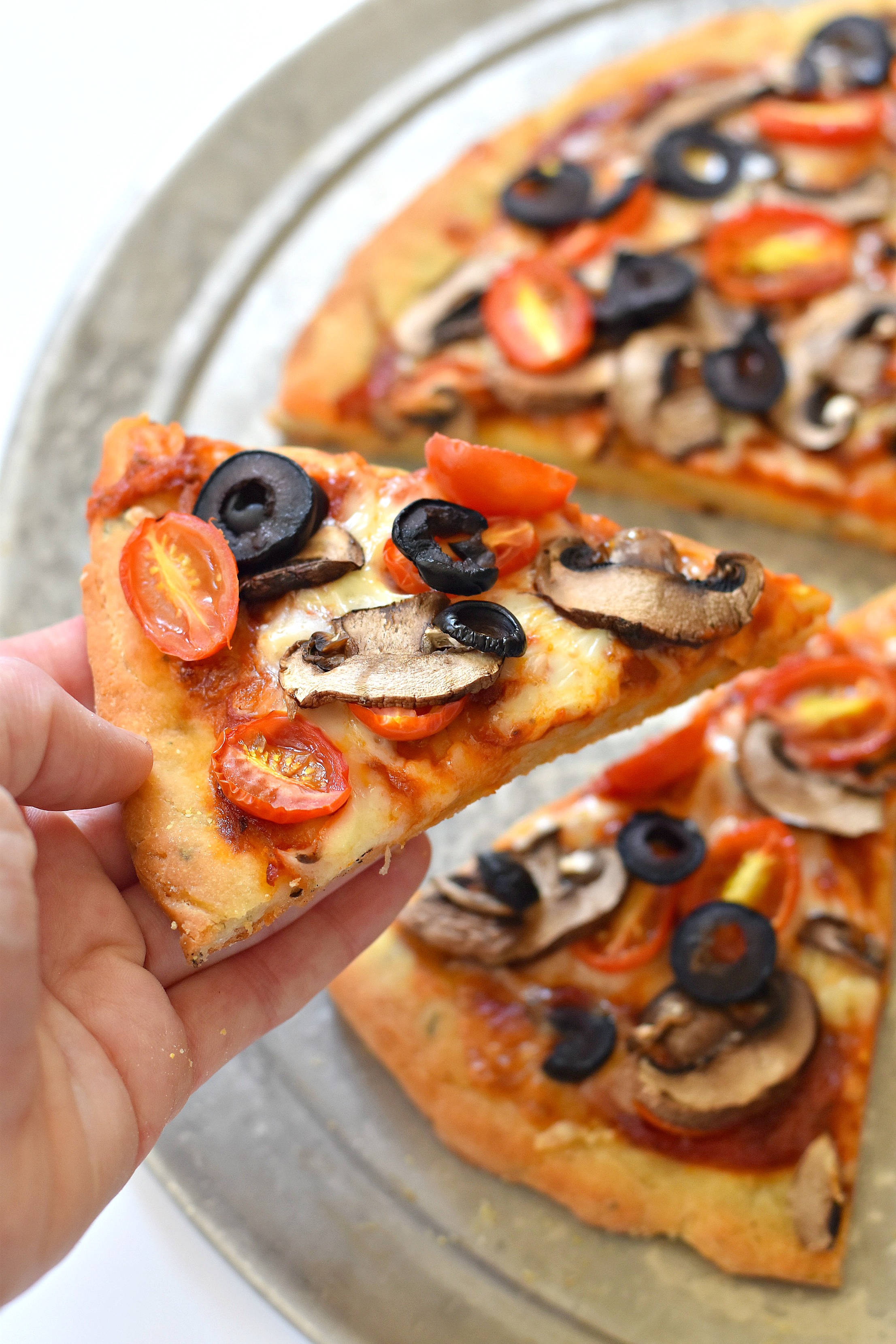 This recipe for a gluten free vegan pizza dough makes for the perfect ...